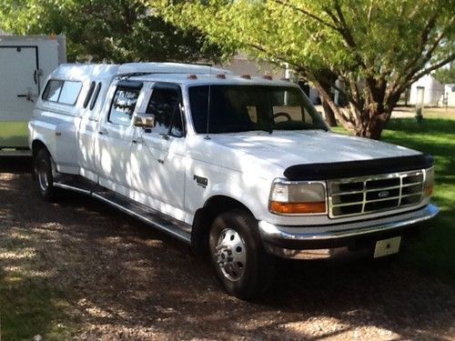 1-ton dually,crew cab, 143500 miles power stroke ,white exterior,gray interior.