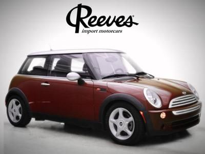 06 mini red 1.6l 4 cylinder engine 4-wheel abs 4-wheel disc brakes 5-speed m/t