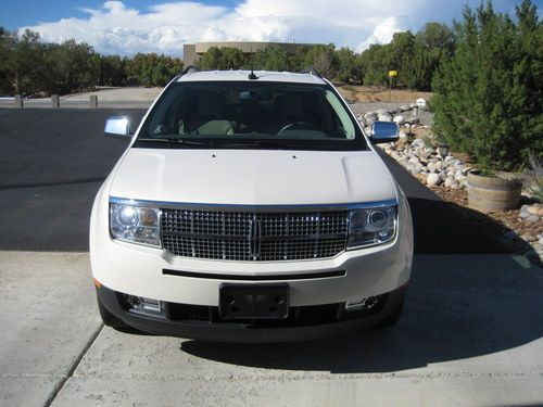 2008 awd white chocolate tricolor exterior;60,600 mi. $18,500