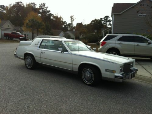White cadillac eldorado biarritz 1984 v-8 with 33,000 miles mint