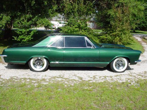 New 350 crate motor  &lt;30,000 mi. 4 bbl, edlebrock carb, custom upholstery,
