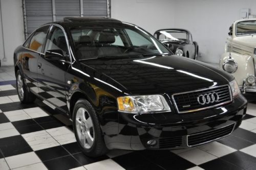 One owner - pristine condition - florida garaged - rare black/black - quattro !