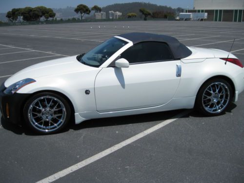 Nissan 350z touring convertible....chrome wheels....pearl white...30k miles!!!