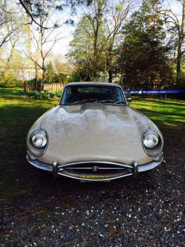 Tan jaguar with brown leather interior, great shape