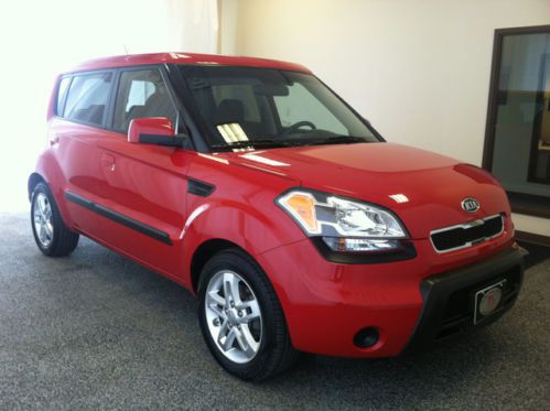 Red 4 door station wagon black interior very clean carfax guarenteed