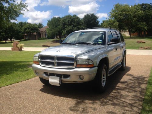 Silver, grey/black cloth interior, garage kept, low mileage