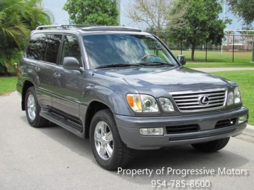 Only 59k miles! gray / gray, spoiler, tow pkg, dvd, navi, stunning s. fl suv!