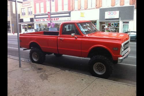 Orange 71 chevy c10 pick-up long bed on a &#039;71 2500 frame 454 big block engine