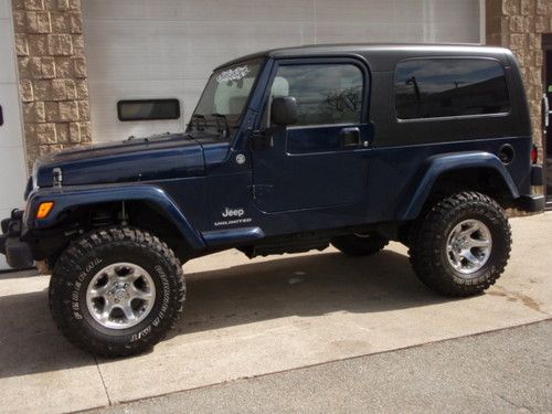 2006 jeep wrangler unlimited    6 cyl, 6-spd, 4 inch suspension lift, new 33's
