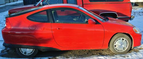 Red 2003 honda insight auto hybrid