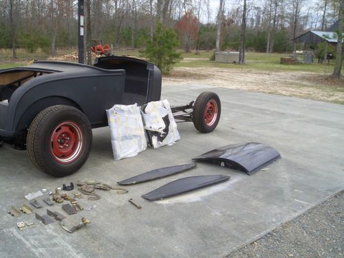 Ford model a aftermarket frame and fiberglass roadster body
