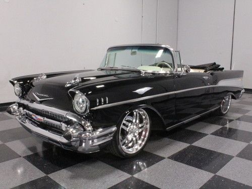 Show-stopping convertible black resto-mod, atomic fuel injection, coil-overs