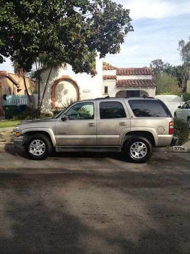 2002 chevrolet tahoe lt sport utility 4-door 5.3l new wrangler p265/70r17 tires