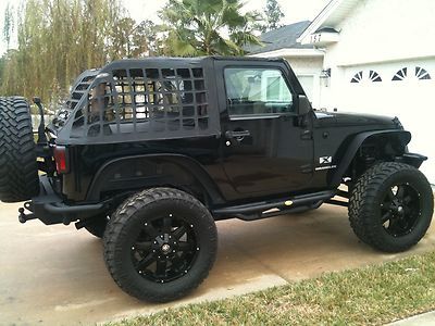 20 jeep wrangler x 4x4 6" lift 35" tires custom exhaust seats bumpers &amp; wheels