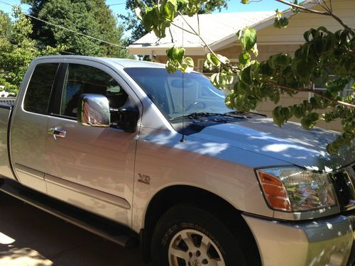 2004 nissan titan le extended cab pickup 4-door 5.6l