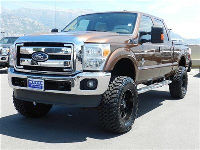 Crew cab ford f350 powerstroke diesel lariat 4x4 custom lift wheels tires nav