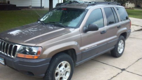 2001 jeep grand cherokee 69k miles. newer tires, runs/drives great. nice suv!