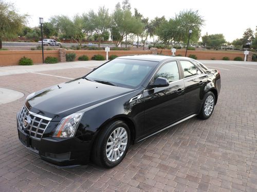 2012 cadillac cts sedan black on black...leather.. mint cond... 11k miles onstar