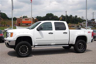 Save at empire chevy on this awesome lifted crew sle leather powertech z71 4x4