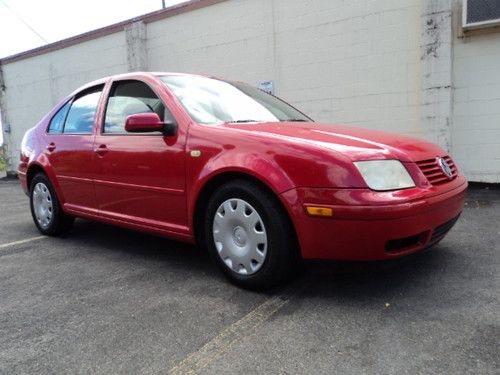 1999new jetta sedan t d i  5speed "red"  "diesel turbo no reserve