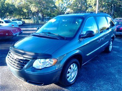 One owner like new cold a/c front and rear stow and go seating all power service