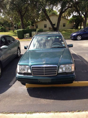 Green mercedes ewagon with third row seating well maintained