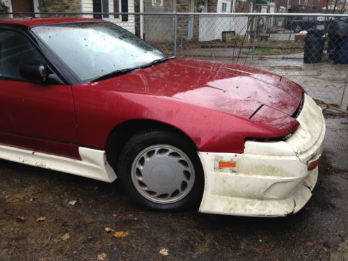 Nissan 240sx hatchback with body kit and front and rear fenders