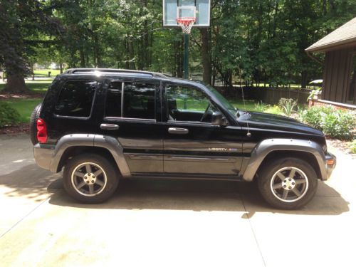 Jeep liberty, black, 4wd, 4 door, sunroof, automatic transmission, 67,000 miles