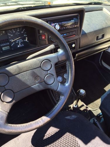 1987 white vw cabriolet in good condition!