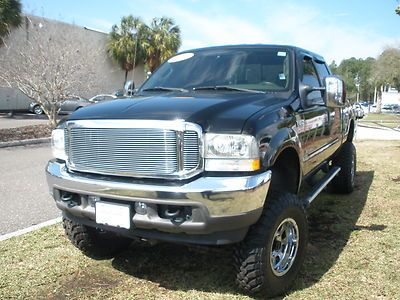 2004 ford f-250  super duty lariat  fx4 off road lifted low miles