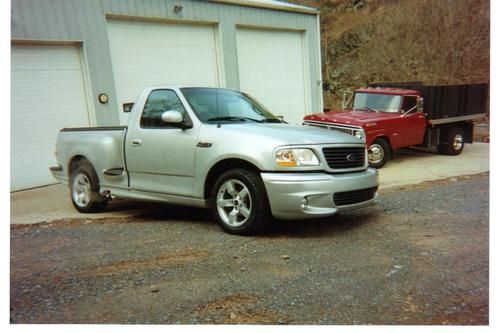 Ford lightning in silver color, never in snow, orginial owner, garage kept.