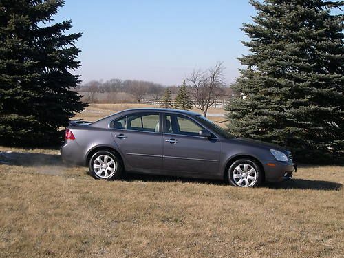 2008 kia optima ex sedan 4-door 2.4l leather seats,exc.condition,garage kept