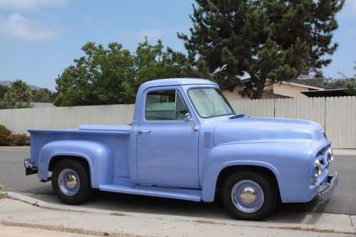 1955 ford f-100 classic truck. light blue with ghost flames