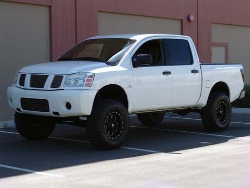 2004 nissan titan le crew cab pickup 4-door 5.6l, lifted, mud terrain tires