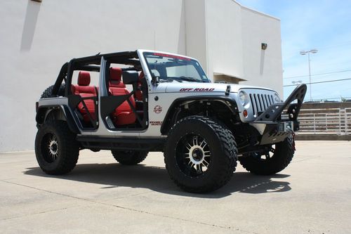 2011 jeep wrangler jk unlimited sport 4-door 3.8l *no limit custom* lifted