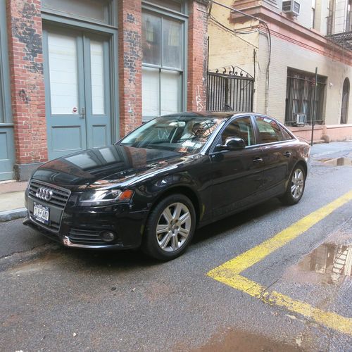 2009 audi a4 base sedan 4-door 2.0l stick shift black 22.5k miles