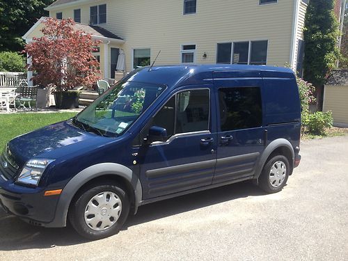 Blue 2011 ford transit connect 4 door mini van seats 5 has 44 thousand miles