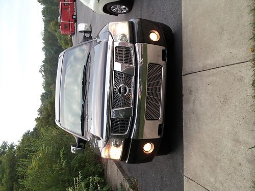 2004 nissan titan le crew cab pickup 4-door 5.6l