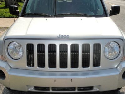 2007 jeep patriot sport! crazee lo miles!55k.4wd.rare 5spd.nav.no reserve!!!!