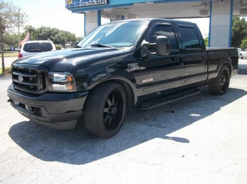 2004 ford f-250 sd 24" rims, navi, back-up cam