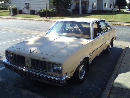 Cream, clean condition interior and exterior, runs well, no rust or body damage