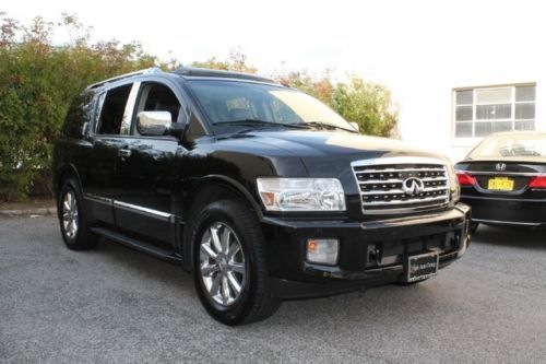 Black leather seats navigation  sunroof hands free communication  back up camera