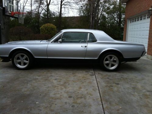 1967 mercury cougar - silver with black stripe