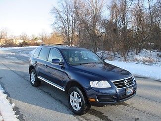 Vw touareg leather heated seats navigation low miles one owner fully serviced