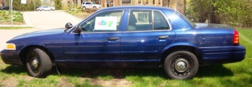 Used police interceptor blue squad car