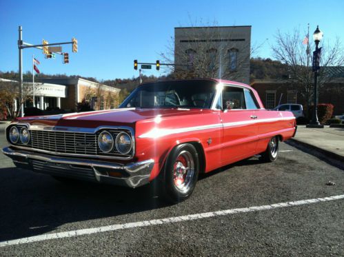 Red 1964 impala ss 2 dr hardtop