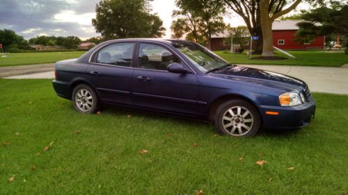 2004 kia optima (114,000 mi) comes with auto-start &amp; block heater!