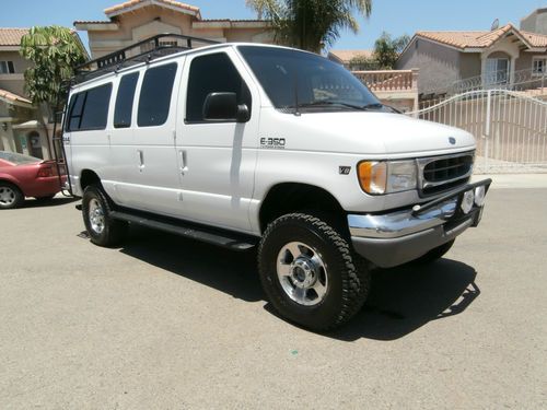 Купить дизельный форд. Ford e350 van 2002. Ford e350 13 мест. Форд дизель. Форд е 350 тюнинг.