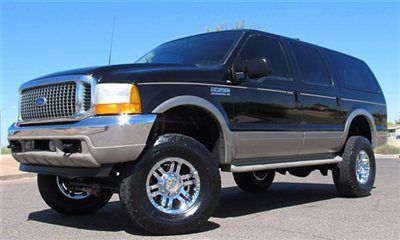 **no reserve** 2001 ford excursion 7.3l diesel lifted 4x4 limited leather clean!