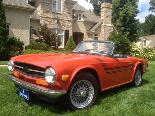 Stunning pimento red with factory overdrive and michelin redline tires